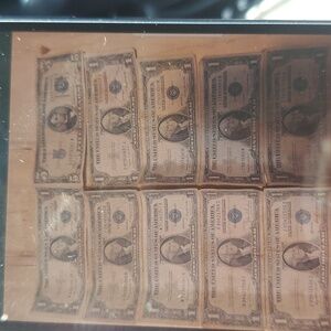 $1 banknotes and $5 banknotes